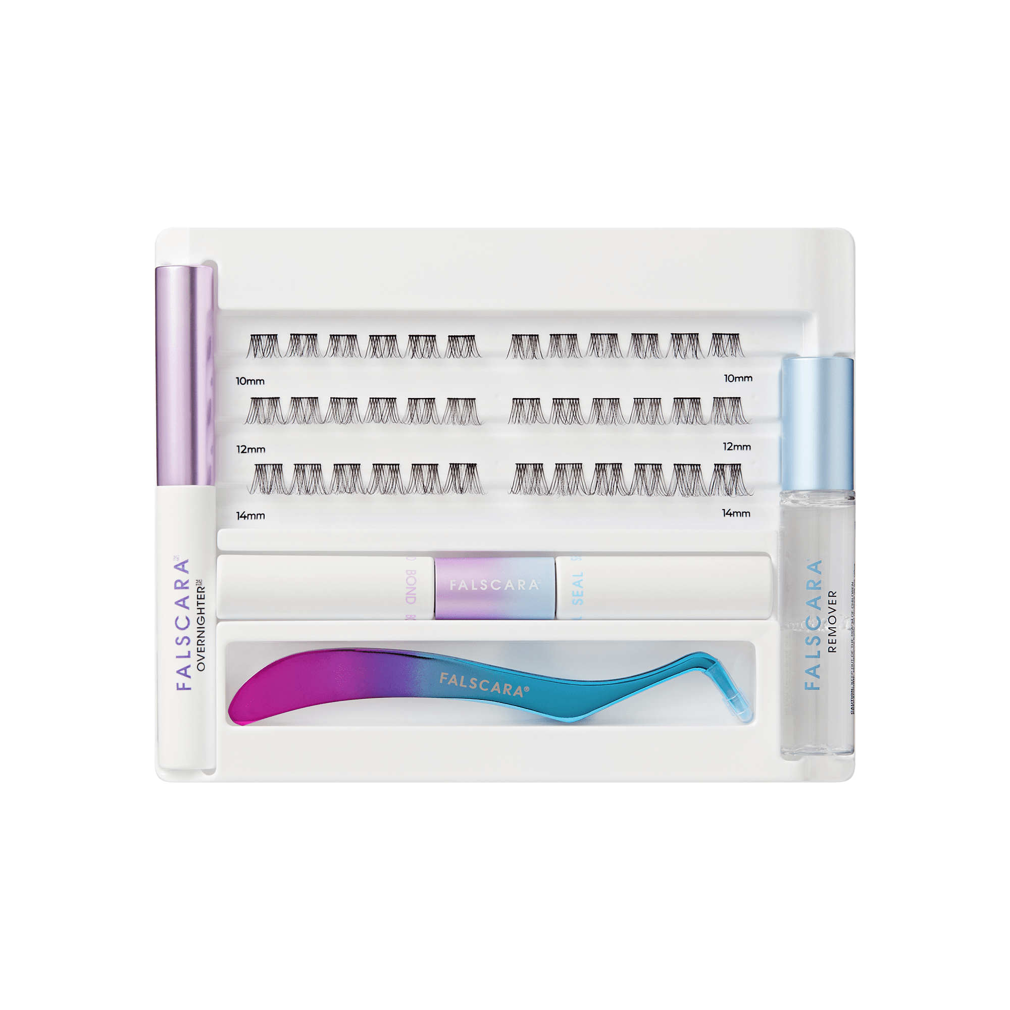 Falscara false eyelash packaging with lashes and tools on a green background