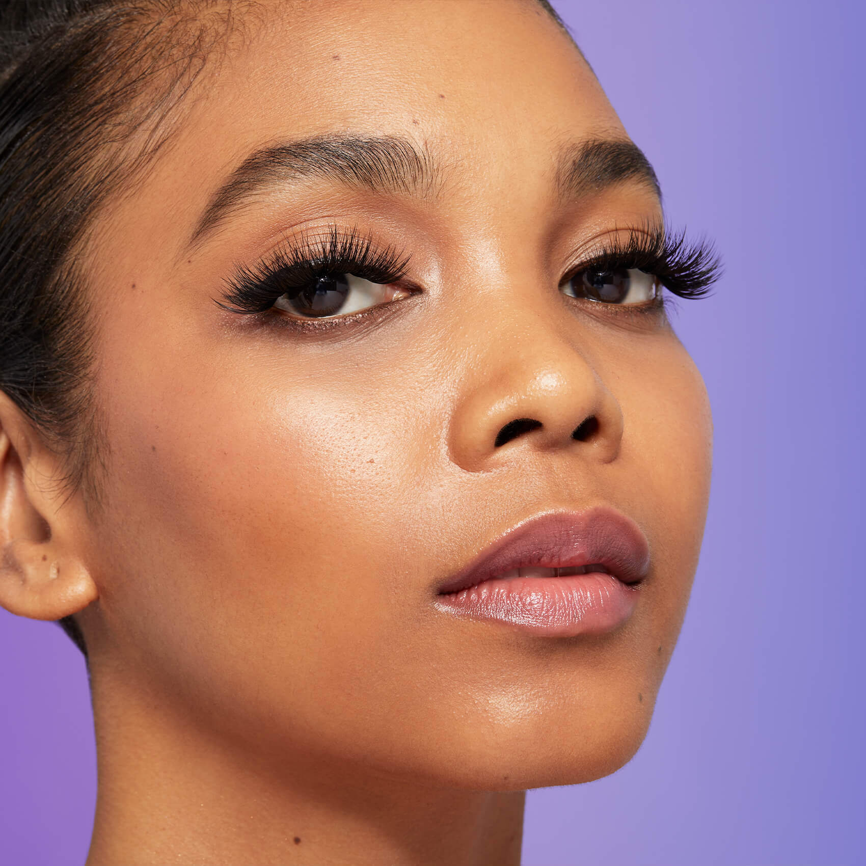 A woman modeling Falscara false lashes in 16mm &