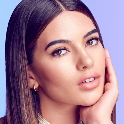 A woman modeling Falscara Studio Palette lashes in "Delicate Spiky". Lashes look full with delicate volumefor an enhanced, natural look.