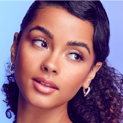 A woman modeling Falscara Studio Palette lashes in "Xtra Spiky". Lashes are spiky, wispy and give natural lashes a more full look with added volume.