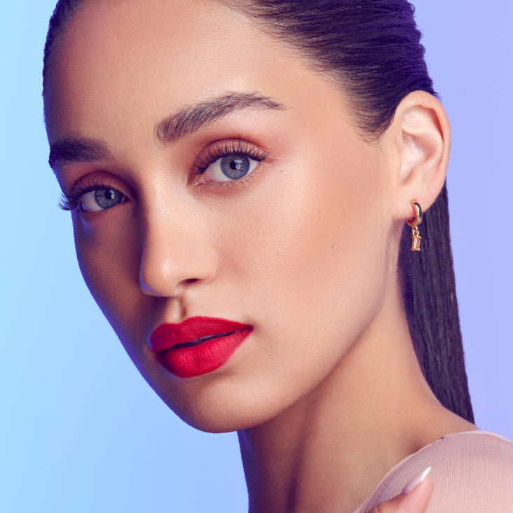 A woman modeling Falscara Studio Palette lashes in "Delicate Fluffy". Lashes are wispy and add a bit of volume to natural lashes for an enhanced, natural lash look. 