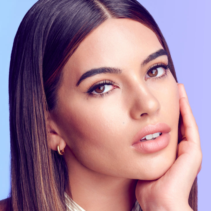 A woman modeling Falscara Studio Palette lashes in "Delicate Spiky". Lashes look full with delicate volumefor an enhanced, natural look. 