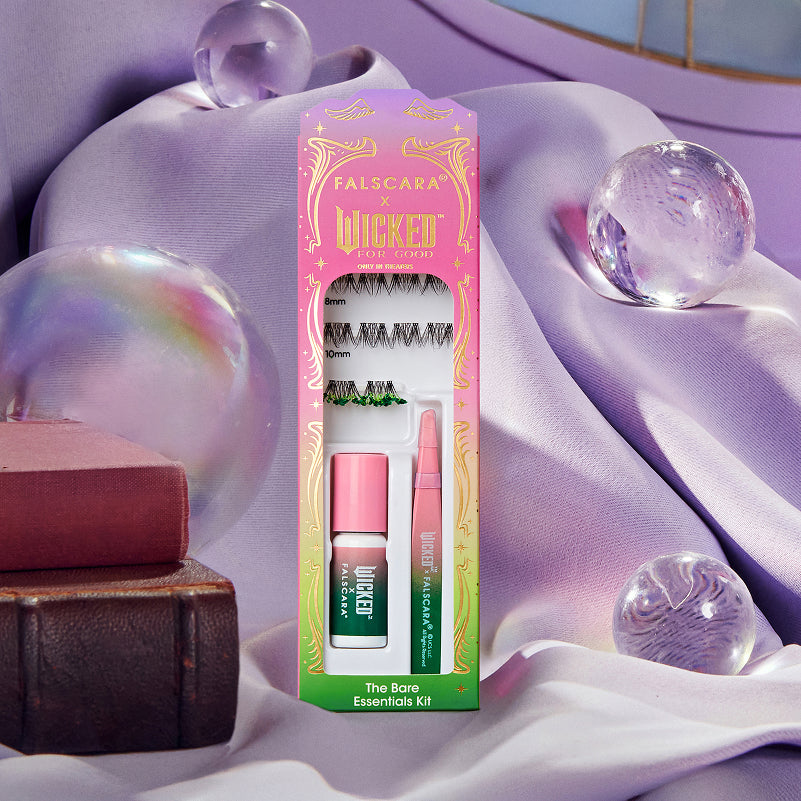 Falscara x Wicked lash kit with pink applicator on purple fabric with glass spheres