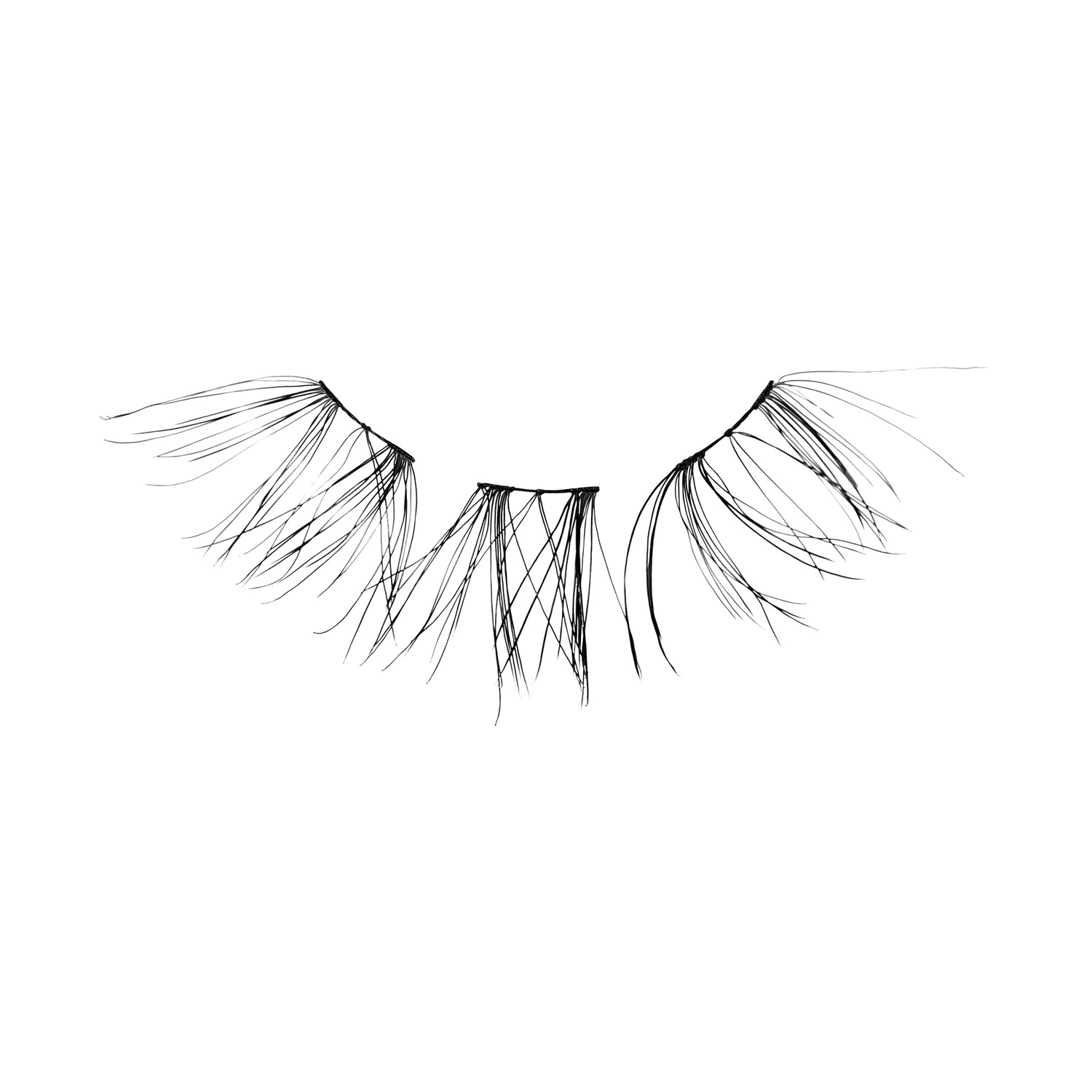 Pair of false eyelashes with wispy, feathered design on white background.